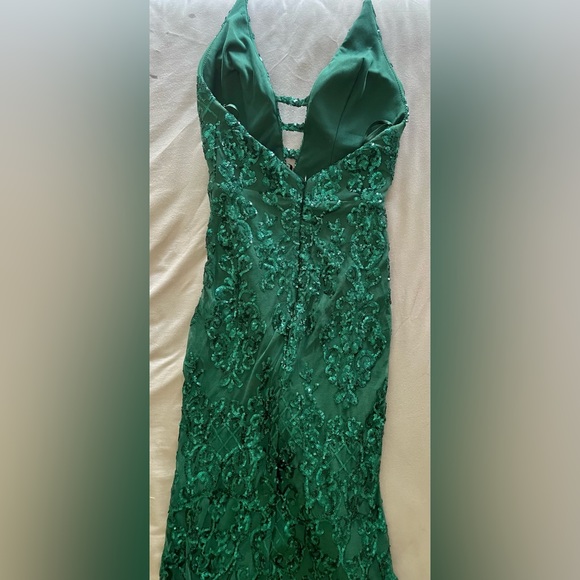 Dark green sequence prom gown. Form fitting and soft material on the inside. - Picture 3 of 3